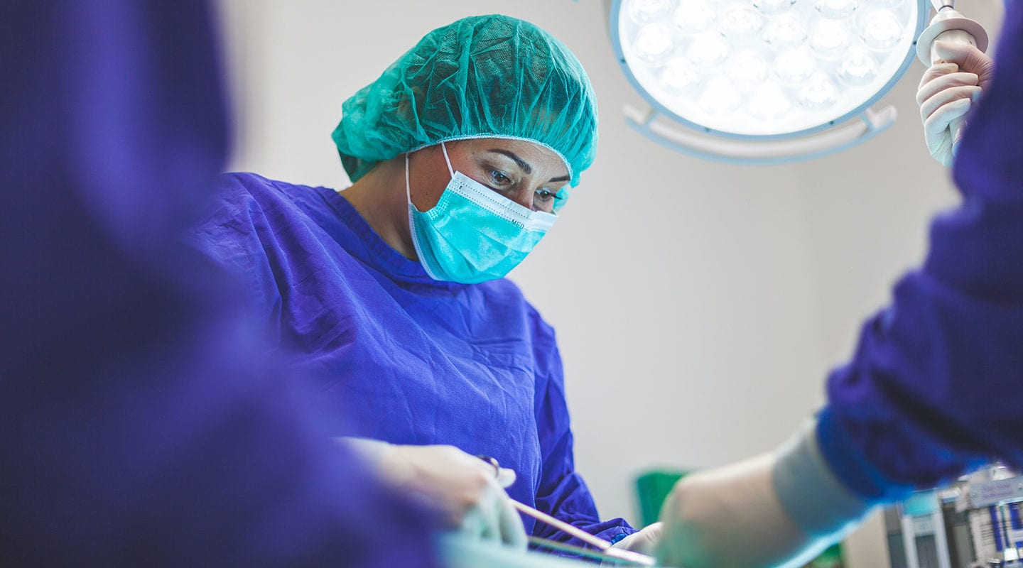 Female doctor in the operating room